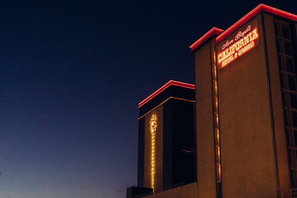 The hotel tower lit up after dark
